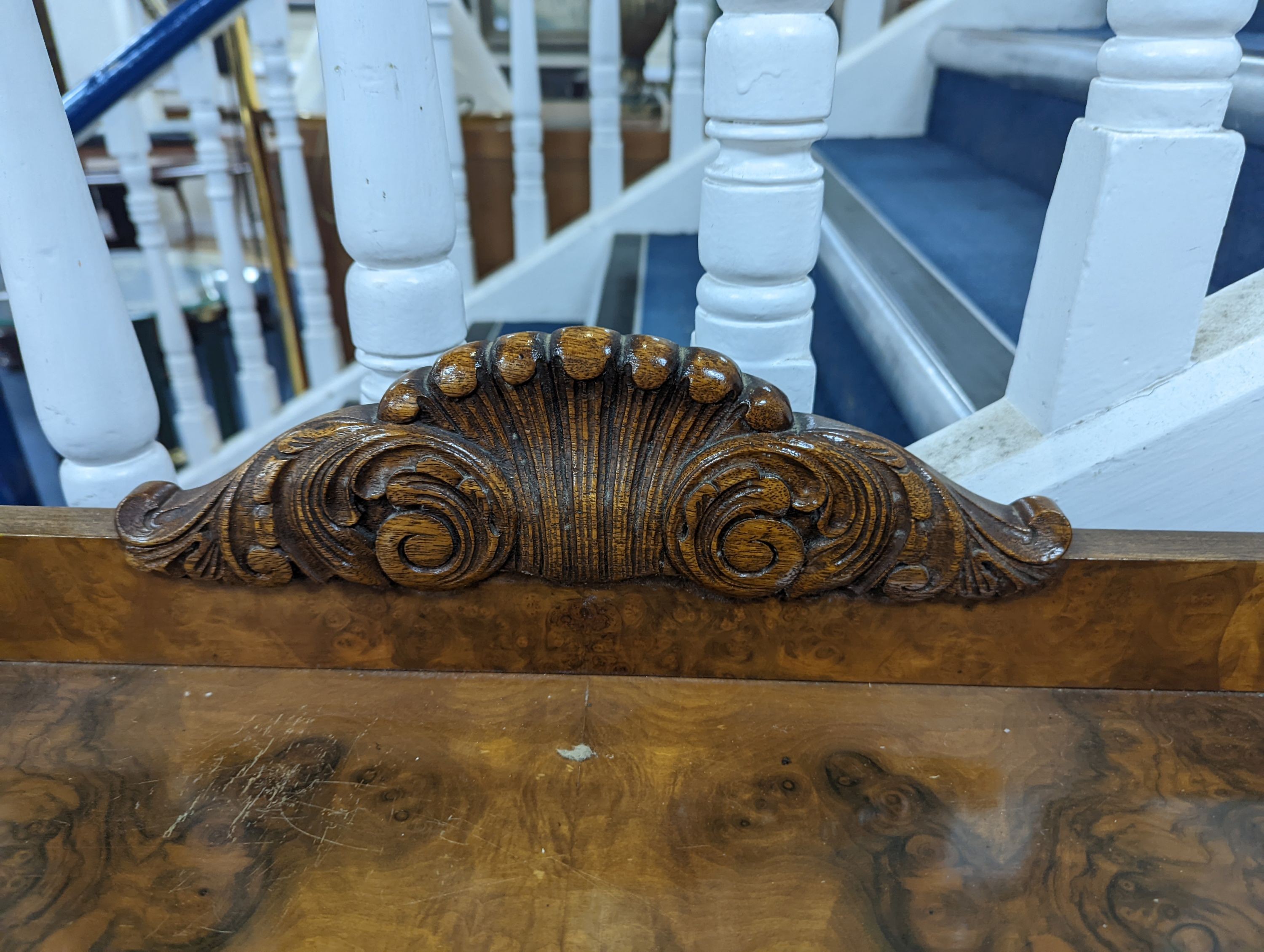 A Queen Anne revival burr walnut dining suite, comprising serpentine sideboard, length 168cm, depth 56cm, height 98cm, extending dining table, 210cm extended, one spare leaf, width 90cm, height 75cm and eight chairs, two